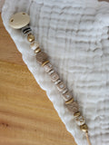 Attache-tétine relief beige