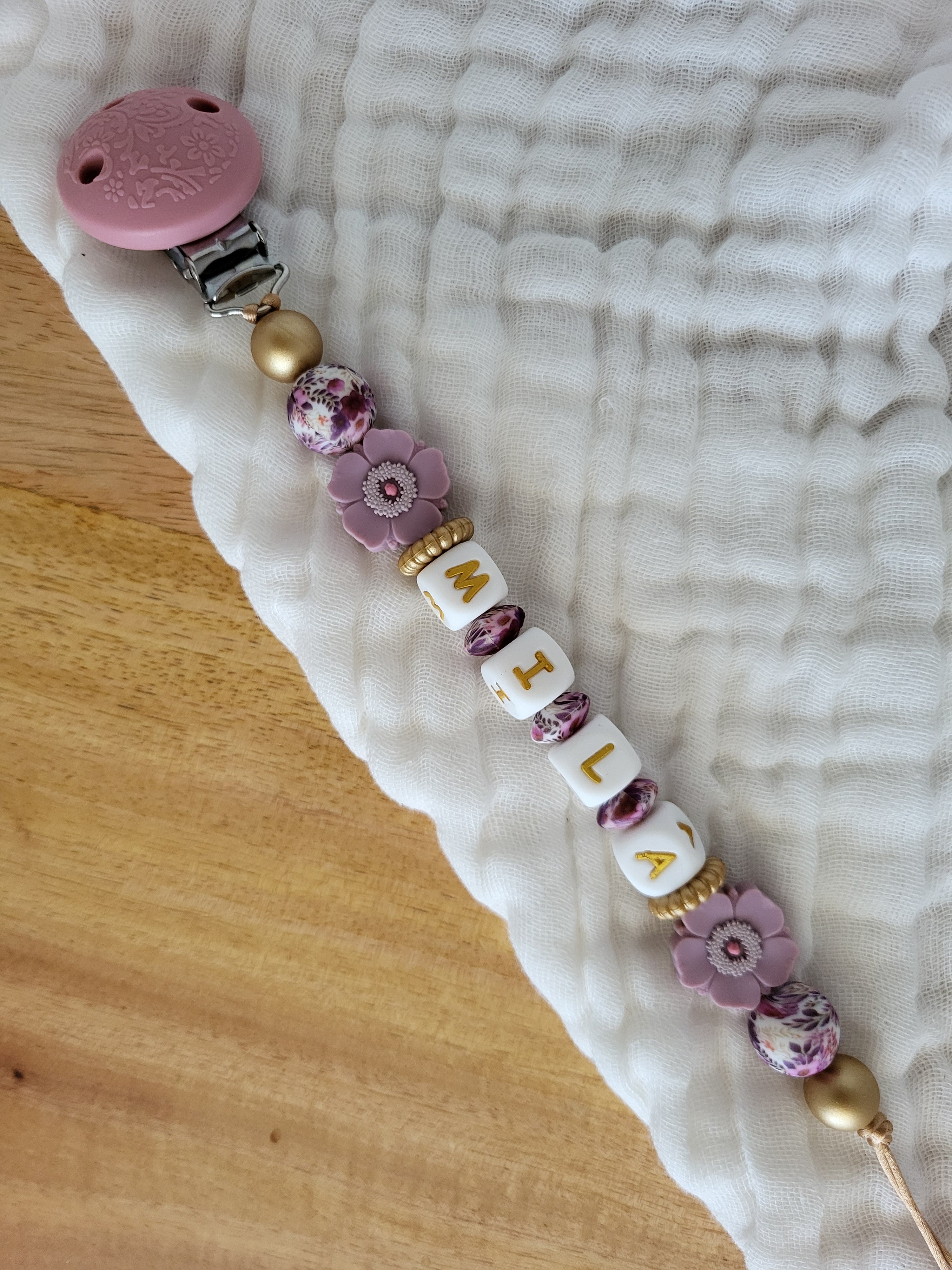 Attache-tétine rose clip relief