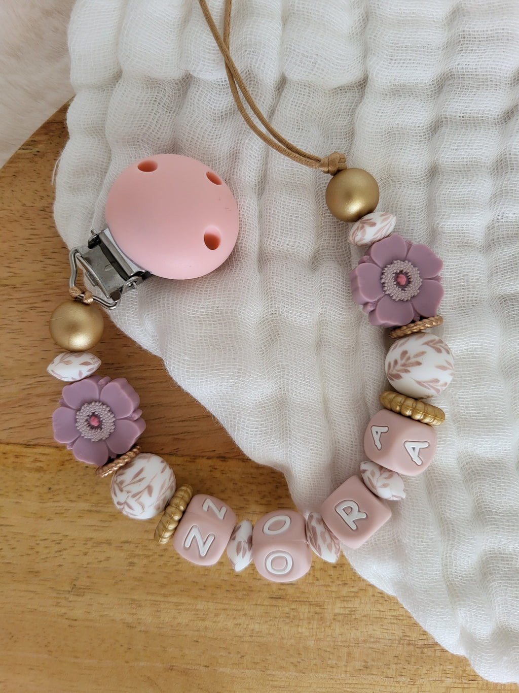 Attache-tétine fleur clip rose