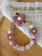 Attache-tétine fille marguerite rose