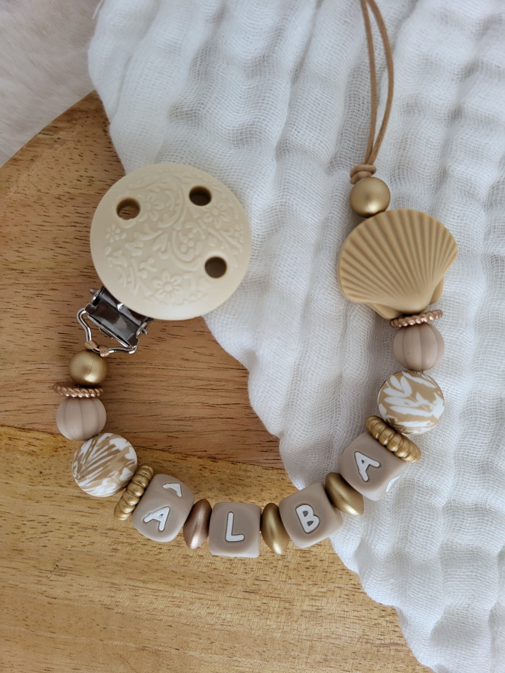 Attache-tétine coquillage