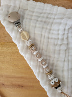 Attache-tétine biche feuille beige