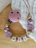 Attache-tétine rose clip relief