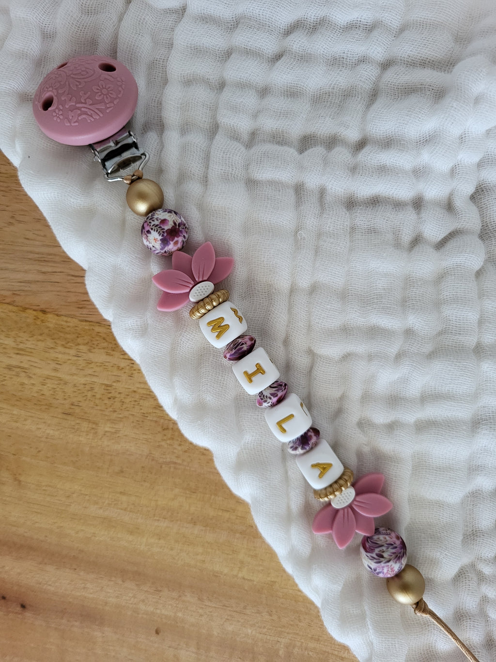 Attache-tétine clip relief,  rose et doré