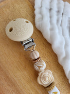 Attache-tétine clip relief