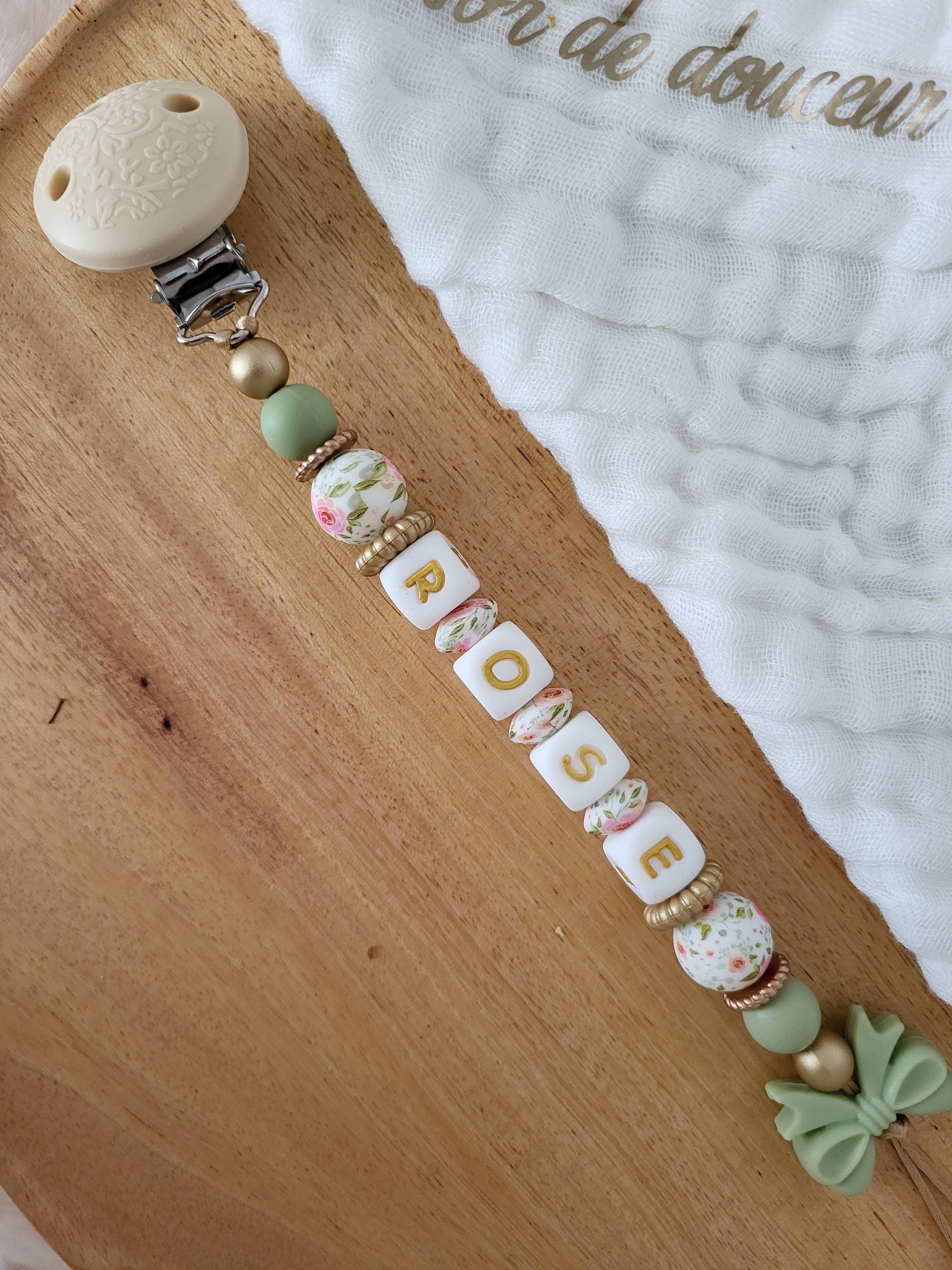 Attache-tétine fille noeud vert