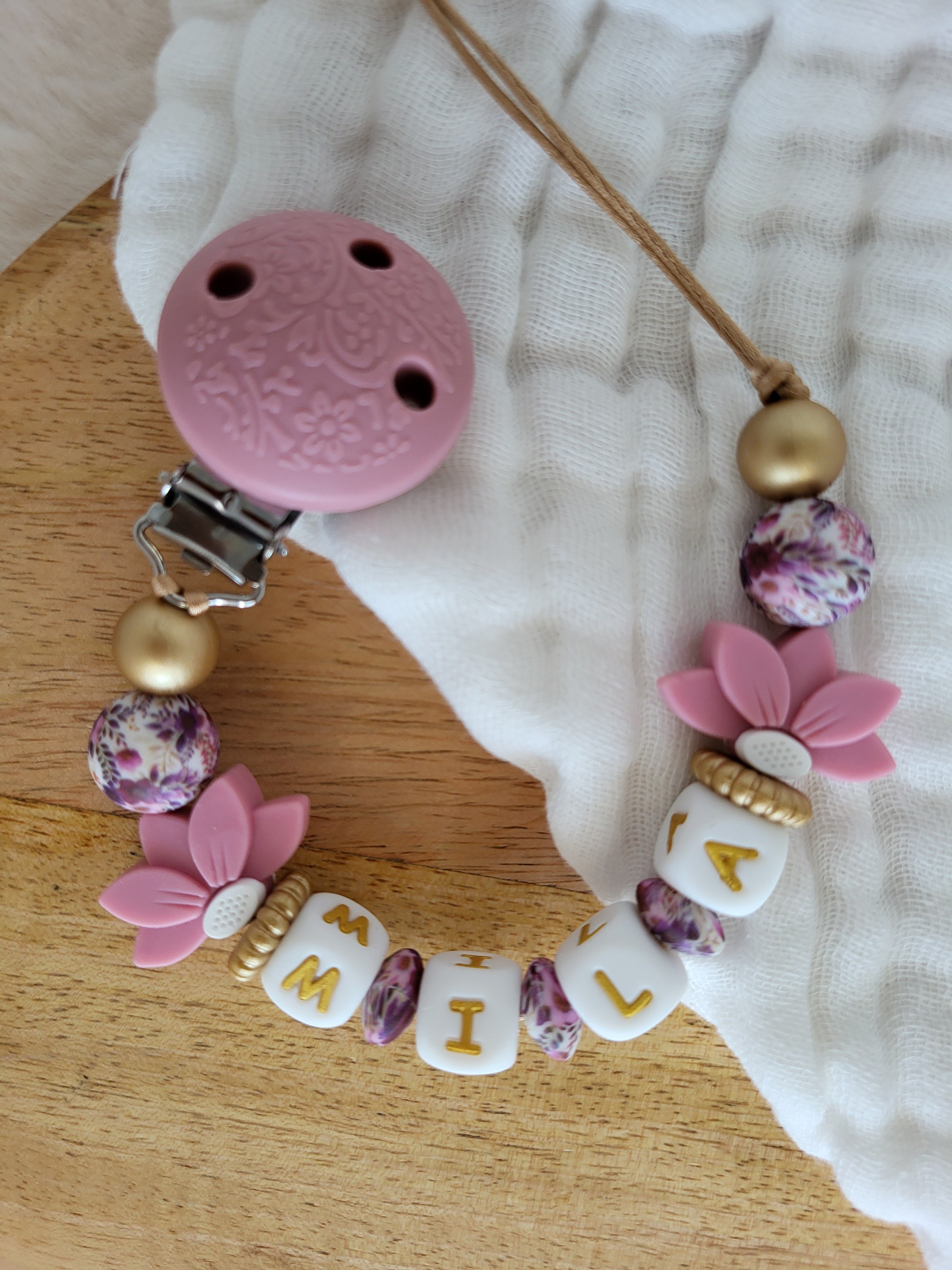 Attache-tétine clip relief,  rose et doré